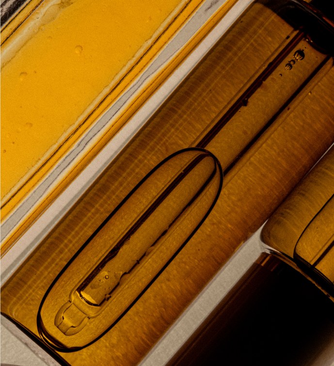 Close-up of amber laboratory glassware