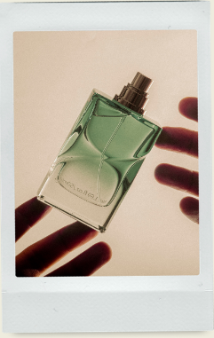 Green glass perfume bottle