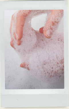 Body wash lather in cupped hands